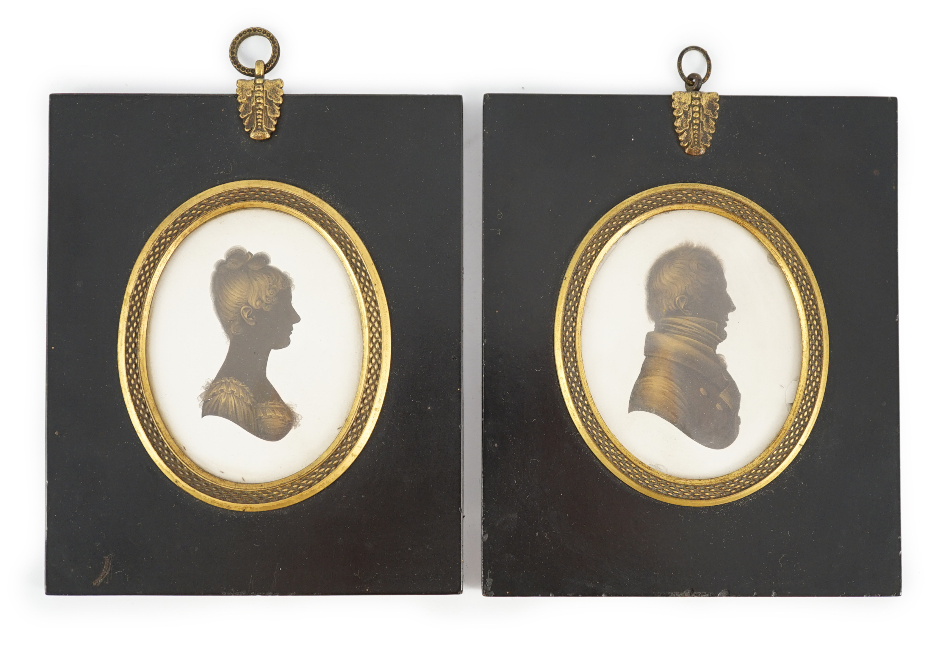 John Miers (1756-1821), Silhouettes of a lady and gentleman, painted and bronzed plaster (2), 8.1 x 6.3cm.